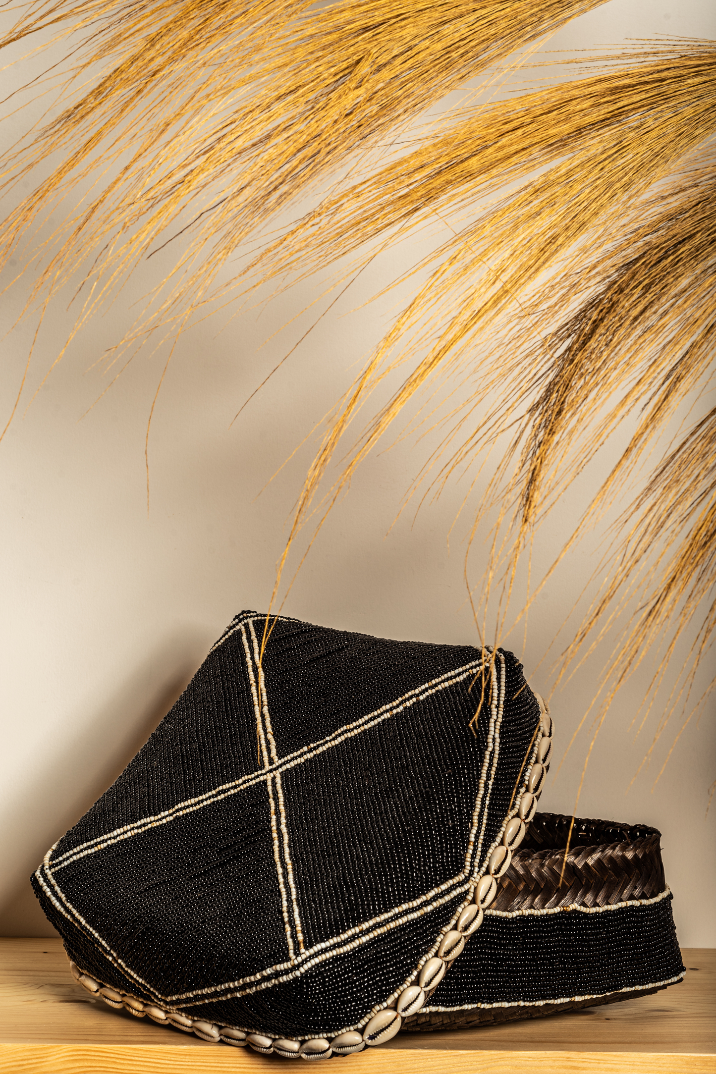 Box made of bamboo, beads and shells